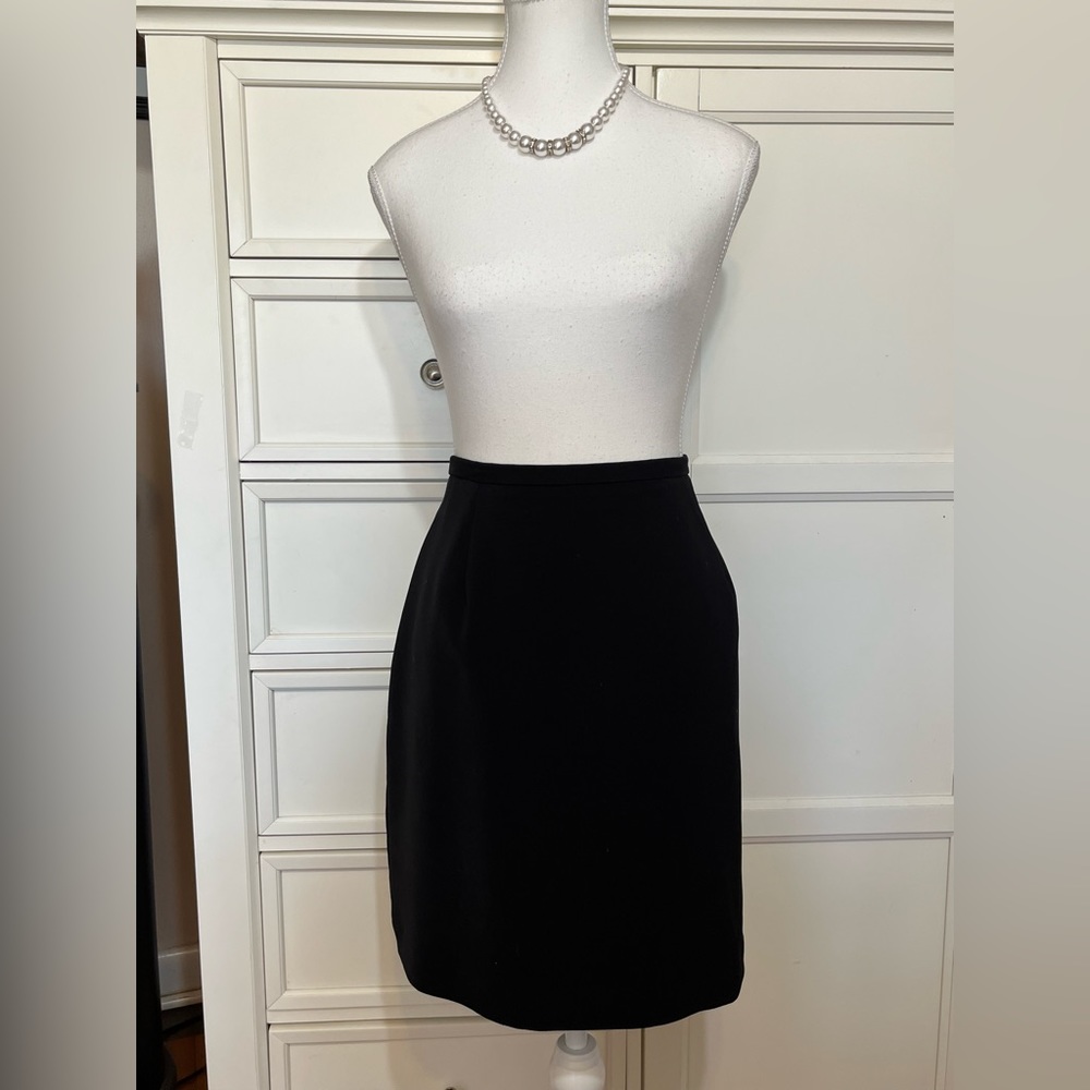 4/$25.   Black pencil skirt Size 12